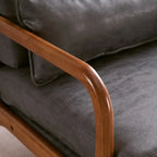 Fauteuil d'appoint à dossier haut avec cadre en bois et accoudoirs rembourrés