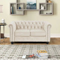 Causeuse Chesterfield en velours avec capitonnage, garniture cloutée et pieds en bois massif