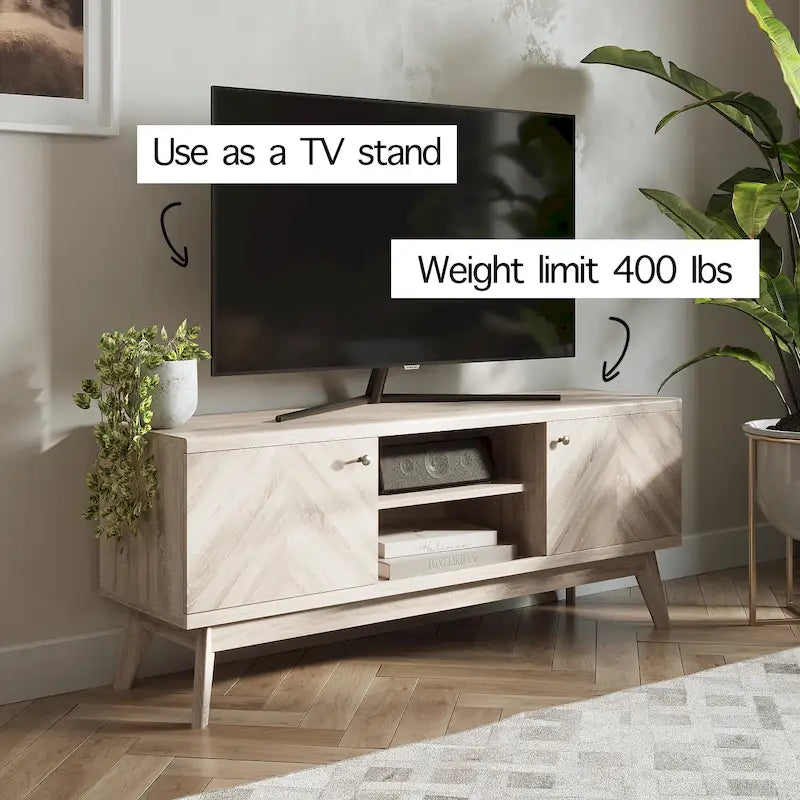Meuble TV avec portes de placard à chevrons et pieds en bois, convient aux téléviseurs jusqu'à 65 pouces